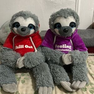 Pair of sloth stuffed animals.